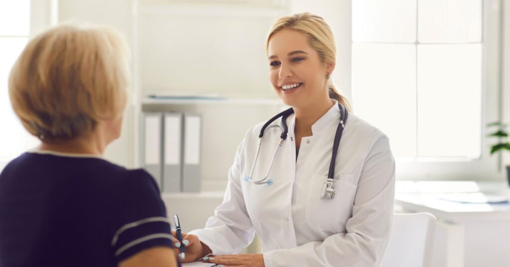 doctor consulting patient health insurance options