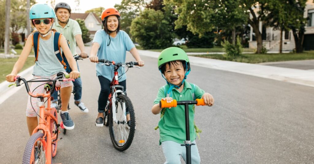 family biking neighborhood health insurance