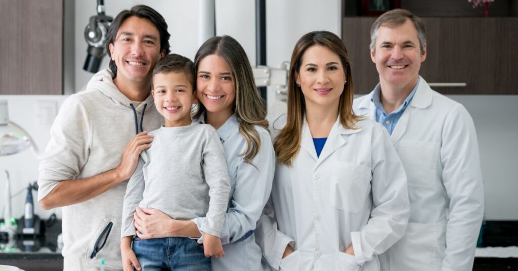 family with doctors health insurance visit